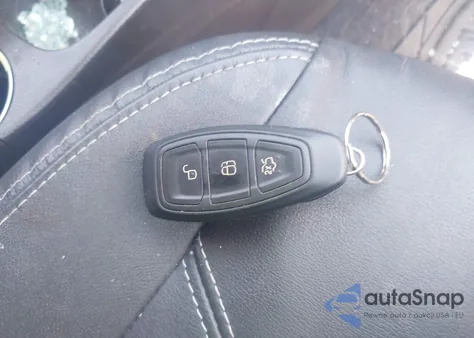 2015 Ford Fiesta Titanium z USA, uszkodzony, nr VIN 3FADP4FJ0FM212901